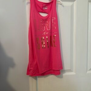 Pink t-shirt with cute message with gold letters.